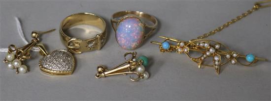 A 9ct gold swallow brooch, an 18ct gold and pave set diamond pendant, two rings and a pair of earrings.